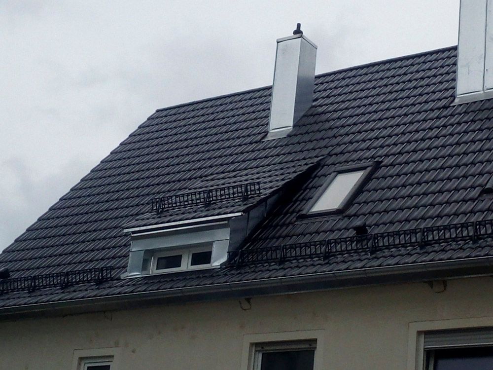 Dacheindeckung und Gauben